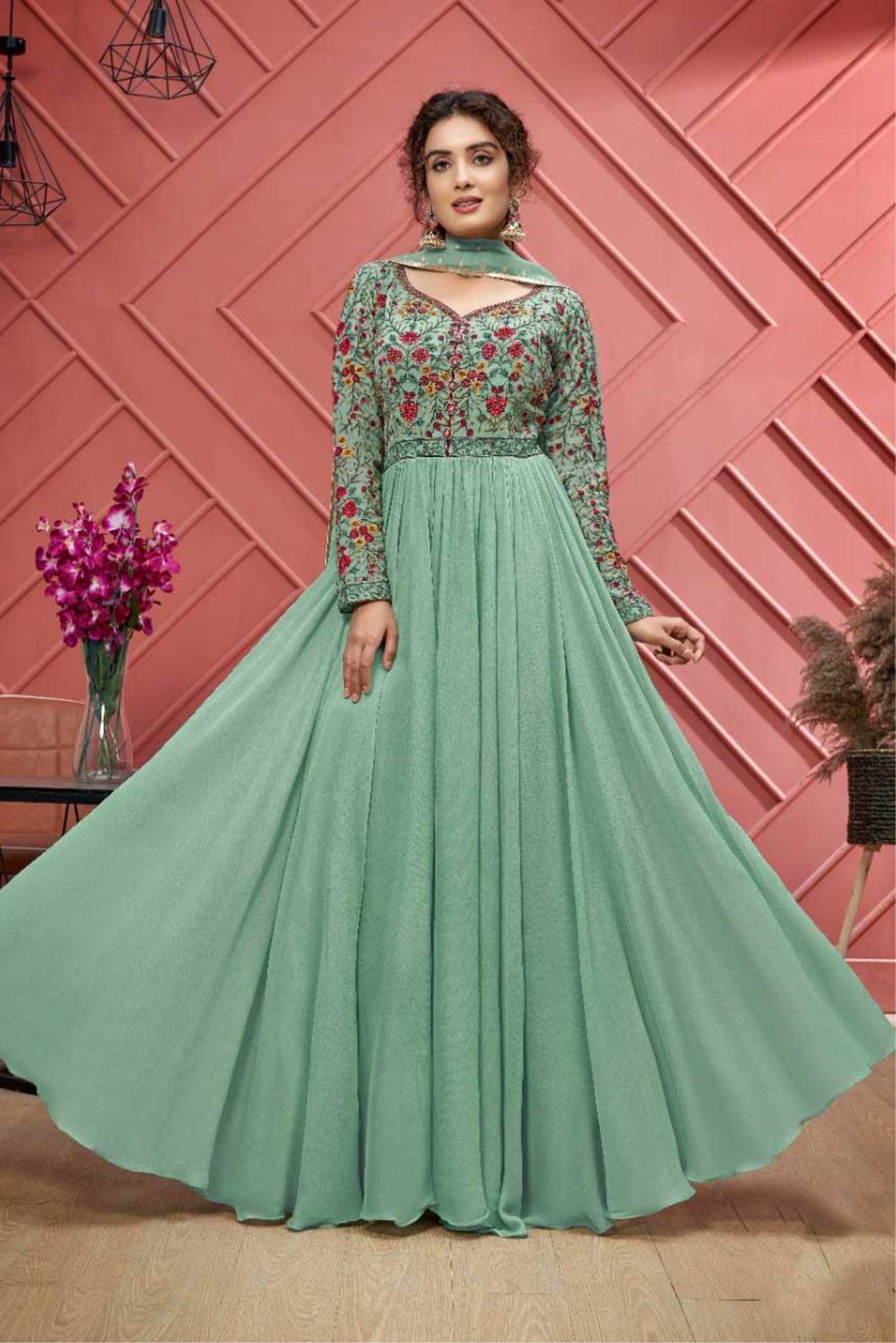 Net Fabric Trendy Fancy Work Festive Wear Gown In Sea Green Color