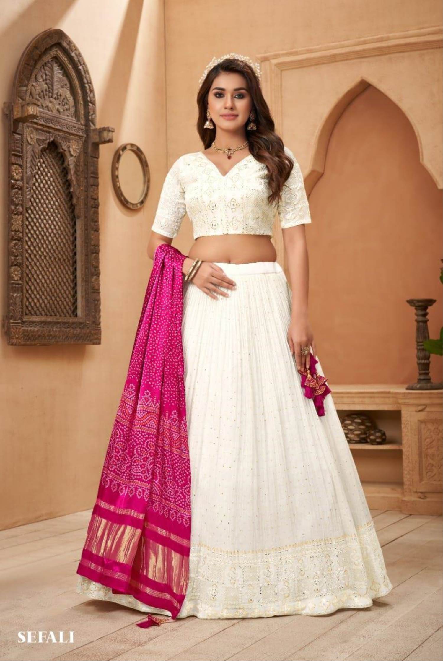 White designer lehenga skirt with allover Chikankari and heavy embelli