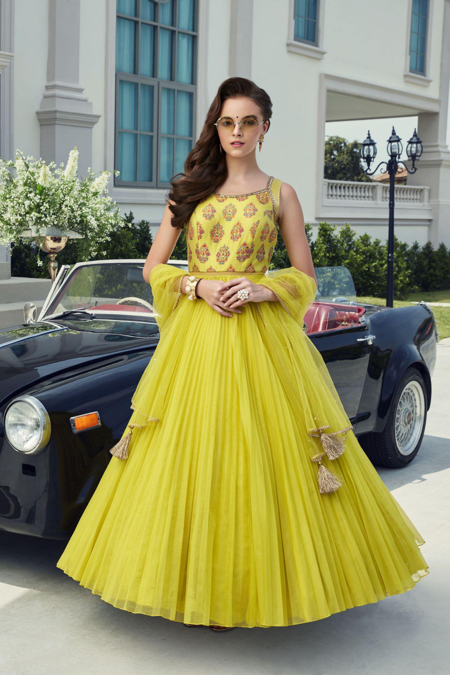 Yellow Color Foil Printed Dola Silk Gown