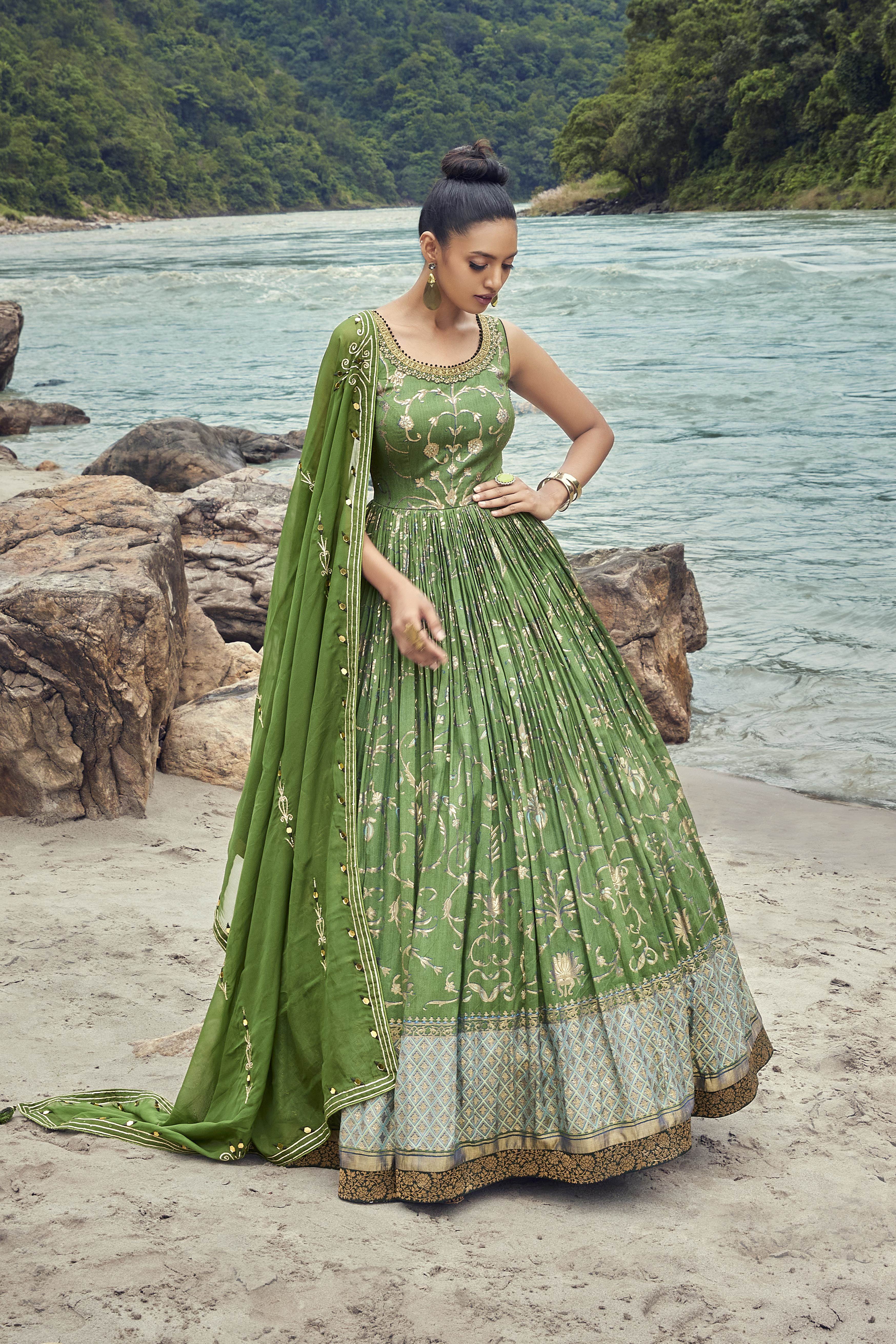 Demure pastel green designer wear long dress With Embroidered Dupatta