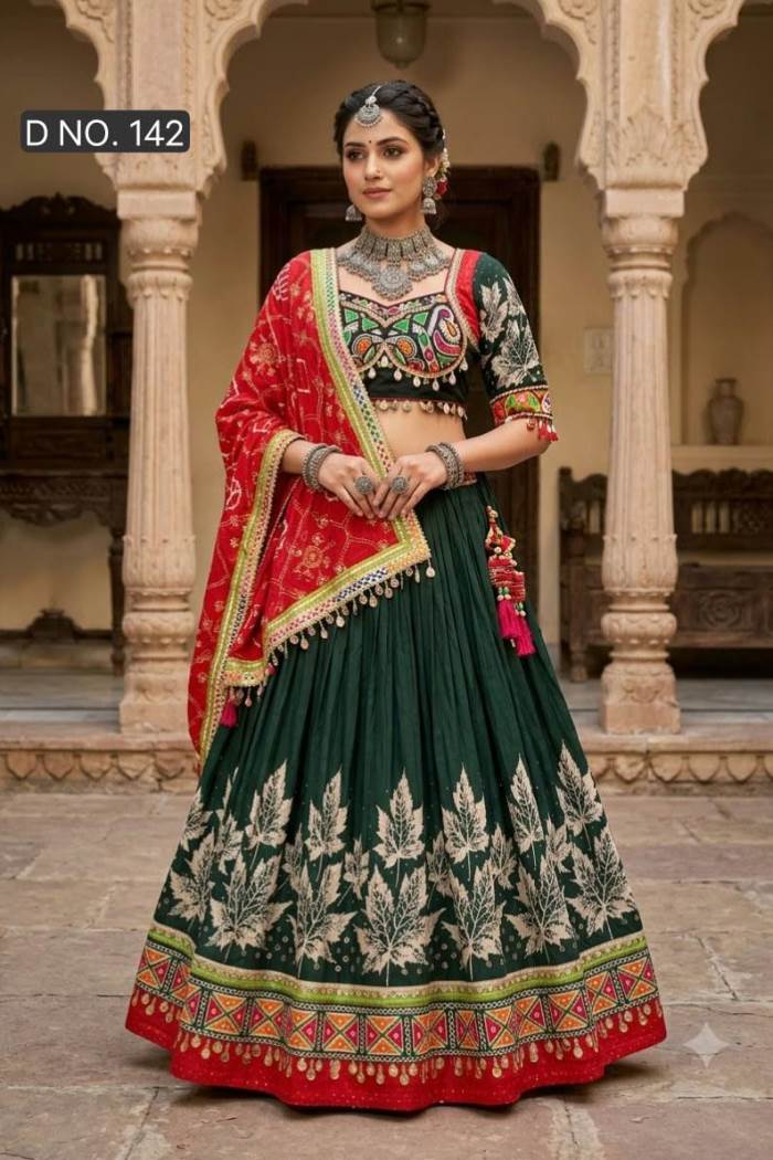 Bottle Green Colour Traditional Navratri Collection Chaniya Choli With Orange Dupatta